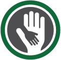 Círculo cinza escuro e contorno verde com a ilustração de uma mão grande segurando uma mão pequena. O ícone representa doação